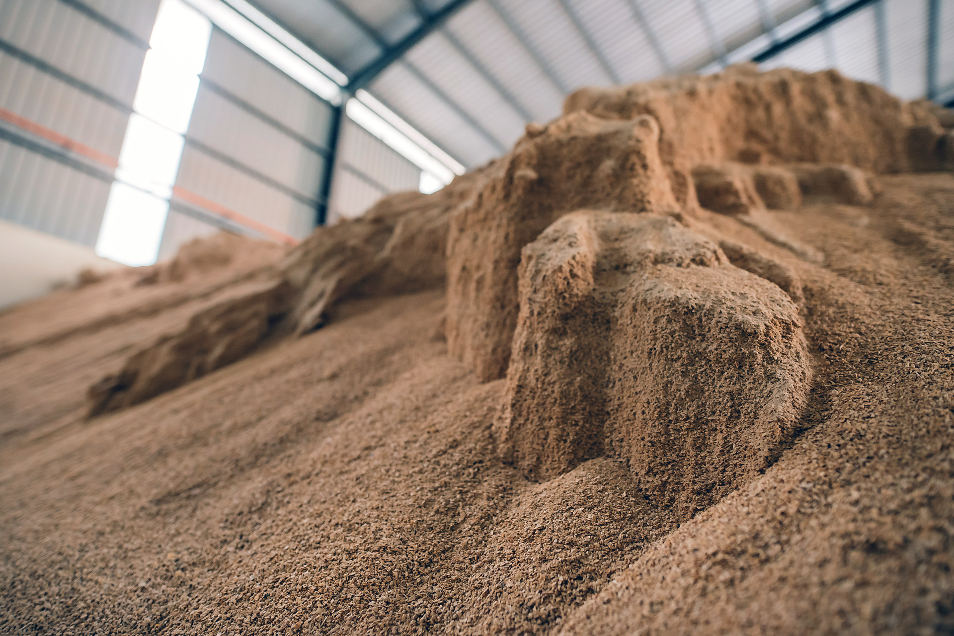 Powdered product in storage building